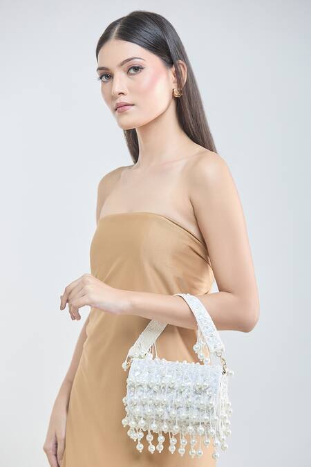Shop_Samyukta Singhania_White Pearls, Sequins And Tassel Embellished Bag_Online_at_Aza_Fashions