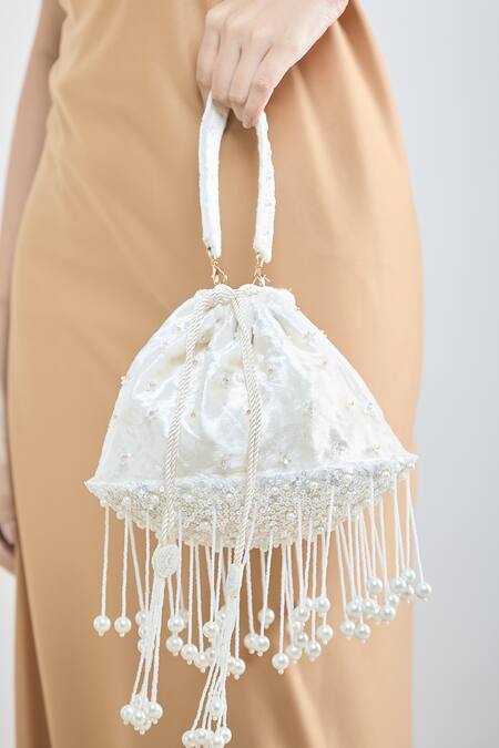 Shop Samyukta Singhania White Pearls, Sequins Flora And Tassel Embellished Potli Bag Online at Aza Fashions Shop_Samyukta Singhania_White Pearls, Sequins Flora And Tassel Embellished Potli Bag_Online_at_Aza_Fashions