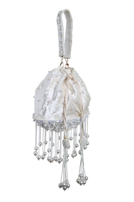 Samyukta Singhania White Pearls, Sequins Flora And Tassel Embellished Potli Bag at Aza Fashions Samyukta Singhania_White Pearls, Sequins Flora And Tassel Embellished Potli Bag_at_Aza_Fashions