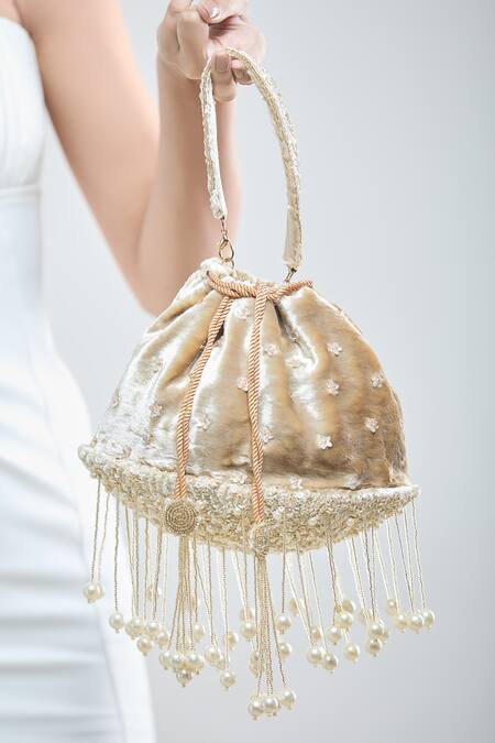 Buy_Samyukta Singhania_Gold Pearls, Sequins Bloom And Tassel Embellished Potli Bag_Online_at_Aza_Fashions