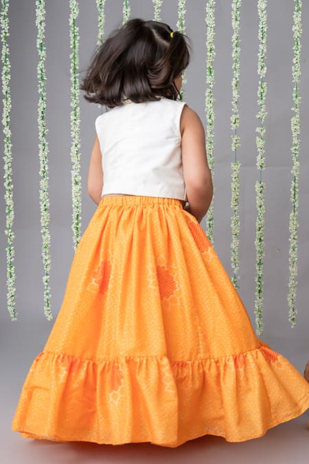 Shop_Label Neeti_Yellow Muslin, Cotton Bows Bandhani Printed Lehenga With Blouse _at_Aza_Fashions