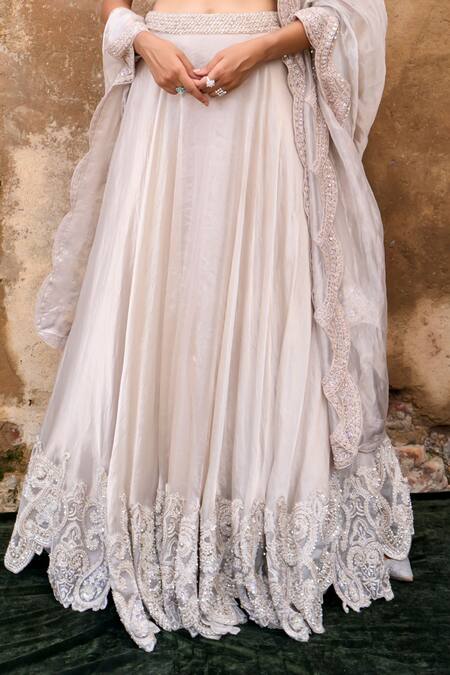 Buy_Ridhima Bhasin_Ivory Organza Sequins, Beads Plunge Almas Embroidered Hem Lehenga Blouse Set _Online_at_Aza_Fashions