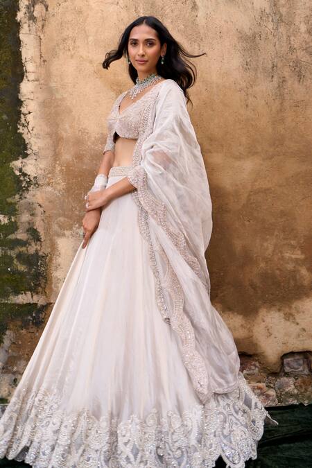 Shop_Ridhima Bhasin_Ivory Organza Sequins, Beads Plunge Almas Embroidered Hem Lehenga Blouse Set _Online_at_Aza_Fashions