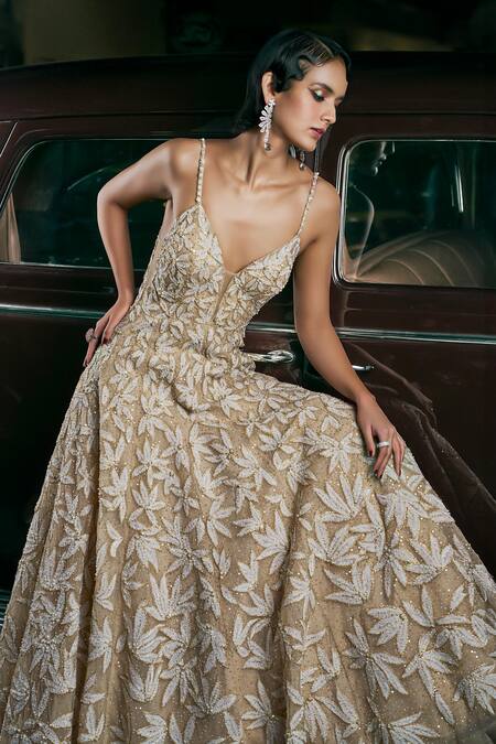 Seema Gujral_Brown Net Pearls, Sequins, Crystals Plunge Neck Embellished Leafy Gown _Online_at_Aza_Fashions