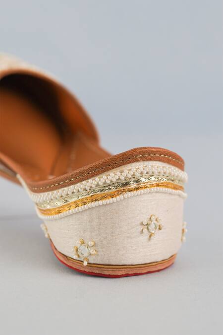 Shop Label Deepti Bajaj White Crystal Pearl And Mirror Bloom Embroidered Juttis Online at Aza Fashions Shop_Label Deepti Bajaj_White Crystal Pearl And Mirror Bloom Embroidered Juttis _Online_at_Aza_Fashions