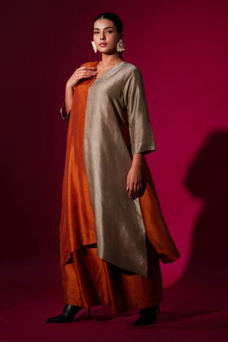 Stoique_Orange Mysore Silk Solid Lucky Pleated Flared Pant _at_Aza_Fashions