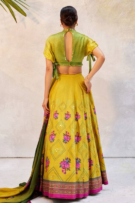 Shop Basil Leaf Yellow Satin, Tussar Mirrors V-neck Floral Pattern Embroidered Lehenga Set at Aza Fashions Shop_Basil Leaf_Yellow Satin, Tussar Mirrors V-neck Floral Pattern Embroidered Lehenga Set_at_Aza_Fashions