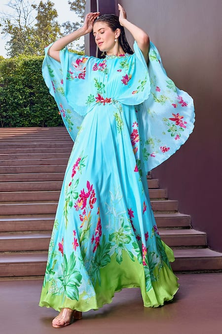 Mandira Wirk Resort Blue Chiffon Round Neck Botanic Bloom Print Cape Sleeves Maxi Dress Online at Aza Fashions Mandira Wirk Resort_Blue Chiffon Round Neck Botanic Bloom Print Cape Sleeves Maxi Dress _Online_at_Aza_Fashions