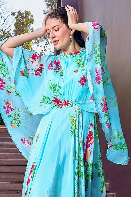 Shop Mandira Wirk Resort Blue Chiffon Round Neck Botanic Bloom Print Cape Sleeves Maxi Dress Online at Aza Fashions Shop_Mandira Wirk Resort_Blue Chiffon Round Neck Botanic Bloom Print Cape Sleeves Maxi Dress _Online_at_Aza_Fashions