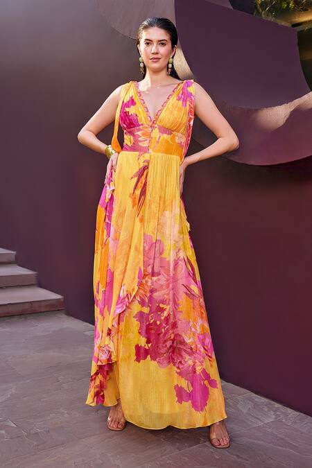 Shop Mandira Wirk Resort Yellow Lurex, Georgette Plunge Neck Floral Print Glittery Striped Maxi Dress Online at Aza Fashions Shop_Mandira Wirk Resort_Yellow Lurex, Georgette Plunge Neck Floral Print Glittery Striped Maxi Dress _Online_at_Aza_Fashions