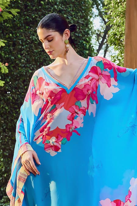 Shop Mandira Wirk Resort Blue Viscose V-neck Vibrant Floral Print Kaftan Online at Aza Fashions Shop_Mandira Wirk Resort_Blue Viscose V-neck Vibrant Floral Print Kaftan _Online_at_Aza_Fashions
