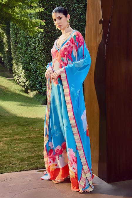 Mandira Wirk Resort Blue Viscose V-neck Vibrant Floral Print Kaftan at Aza Fashions Mandira Wirk Resort_Blue Viscose V-neck Vibrant Floral Print Kaftan _at_Aza_Fashions