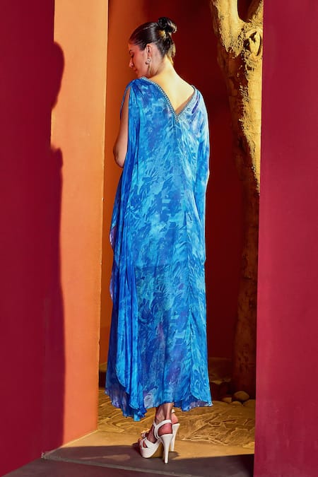 Shop Mandira Wirk Resort Blue Chiffon Plunge Neck Leaf Print Kaftan Dress at Aza Fashions Shop_Mandira Wirk Resort_Blue Chiffon Plunge Neck Leaf Print Kaftan Dress _at_Aza_Fashions