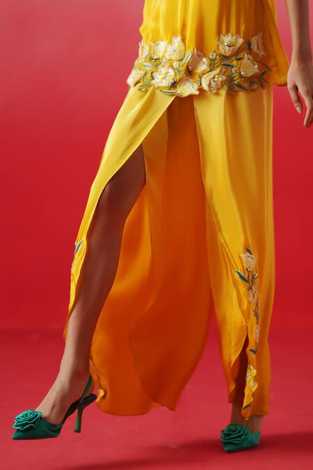 Kavitha Gutta_Yellow Crepe Embroidery Round Sunshine Blossom Cutwork Kurti With Tulip Pant _at_Aza_Fashions