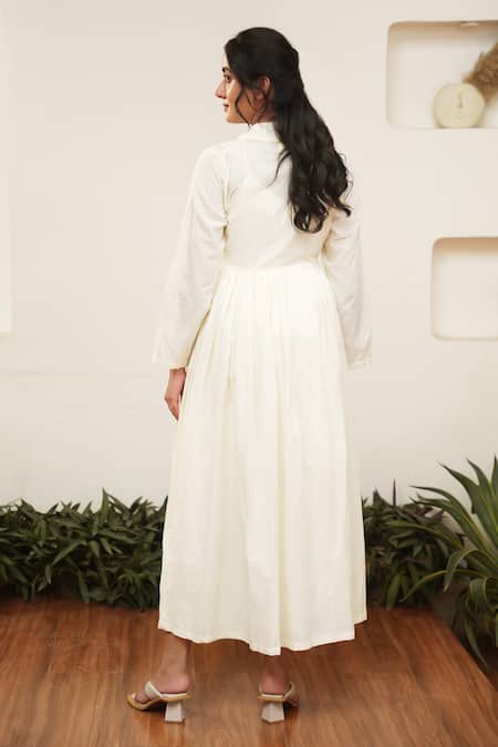 Shop OurDve Beige Cotton Pearls V-neck Embellished Wrap Midi Dress at Aza Fashions Shop_OurDve_Beige Cotton Pearls V-neck Embellished Wrap Midi Dress _at_Aza_Fashions