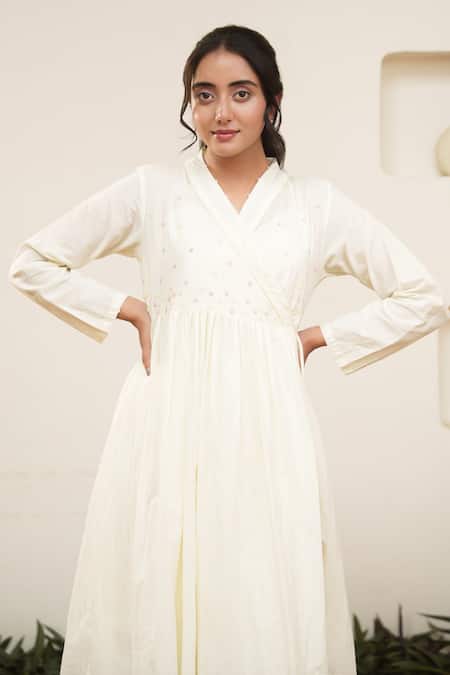 Shop OurDve Beige Cotton Pearls V-neck Embellished Wrap Midi Dress Online at Aza Fashions Shop_OurDve_Beige Cotton Pearls V-neck Embellished Wrap Midi Dress _Online_at_Aza_Fashions