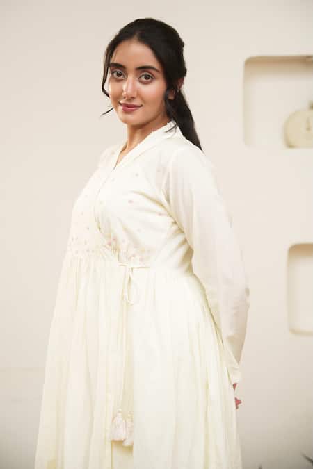 OurDve Beige Cotton Pearls V-neck Embellished Wrap Midi Dress at Aza Fashions OurDve_Beige Cotton Pearls V-neck Embellished Wrap Midi Dress _at_Aza_Fashions