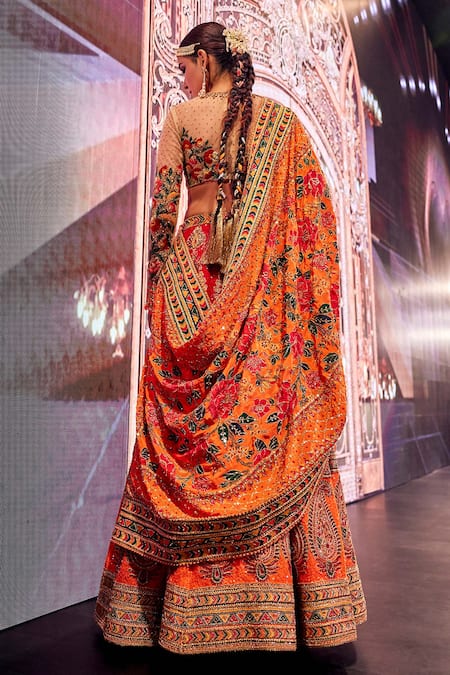 Shop The Royaleum Red Net, Silk, Chiffon Sequins, Beads, Zari Paisley Embroidered Lehenga Set at Aza Fashions Shop_The Royaleum_Red Net, Silk, Chiffon Sequins, Beads, Zari Paisley Embroidered Lehenga Set _at_Aza_Fashions