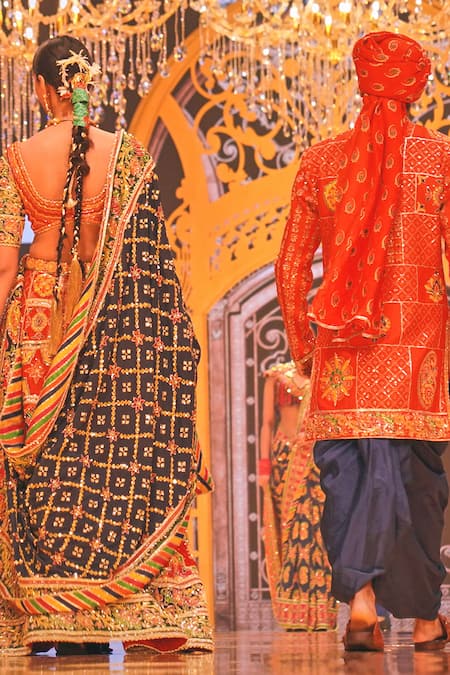 Shop The Royaleum Red Silk Sequins, Embroidery Round Neck Geometric Motifs Lehenga Set at Aza Fashions Shop_The Royaleum_Red Silk Sequins, Embroidery Round Neck Geometric Motifs Lehenga Set _at_Aza_Fashions