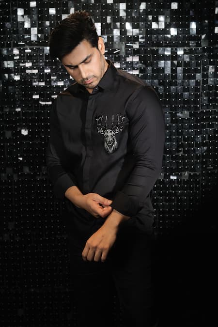 Shop Sanjana Reddy Designs Black Stretchable Cotton Embroidered Cutdana Reindeer Shirt at Aza Fashions Shop_Sanjana Reddy Designs_Black Stretchable Cotton Embroidered Cutdana Reindeer Shirt _at_Aza_Fashions