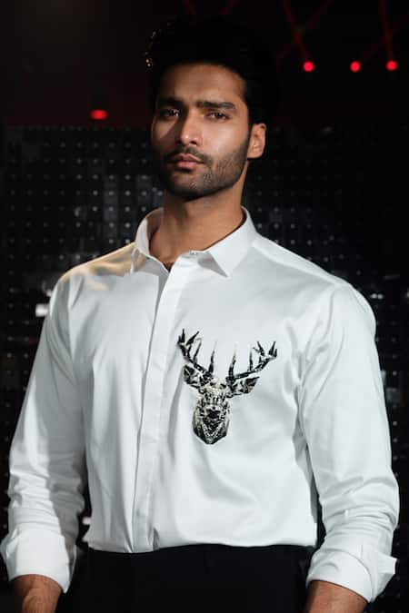 Shop Sanjana Reddy Designs White Cotton Embroidery Cutdana Reindeer Shirt at Aza Fashions Shop_Sanjana Reddy Designs_White Cotton Embroidery Cutdana Reindeer Shirt _at_Aza_Fashions
