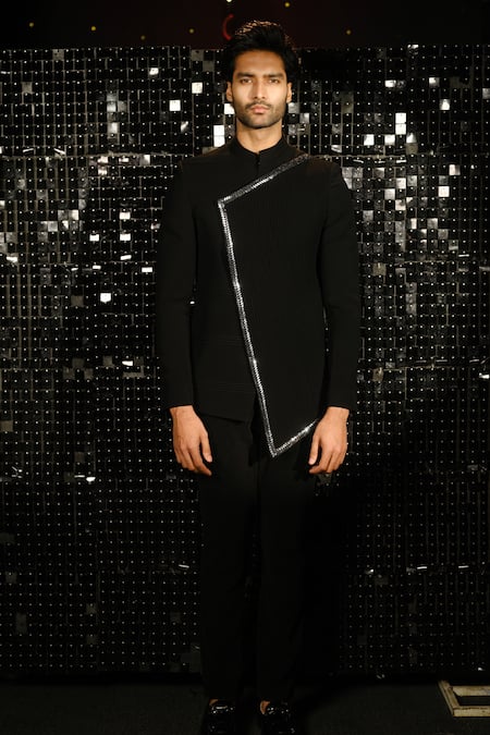 Shop Sanjana Reddy Designs Black Polyester Border Embroidered Pintucked Asymmetric Bandhgala With Trouser at Aza Fashions Shop_Sanjana Reddy Designs_Black Polyester Border Embroidered Pintucked Asymmetric Bandhgala With Trouser _at_Aza_Fashions