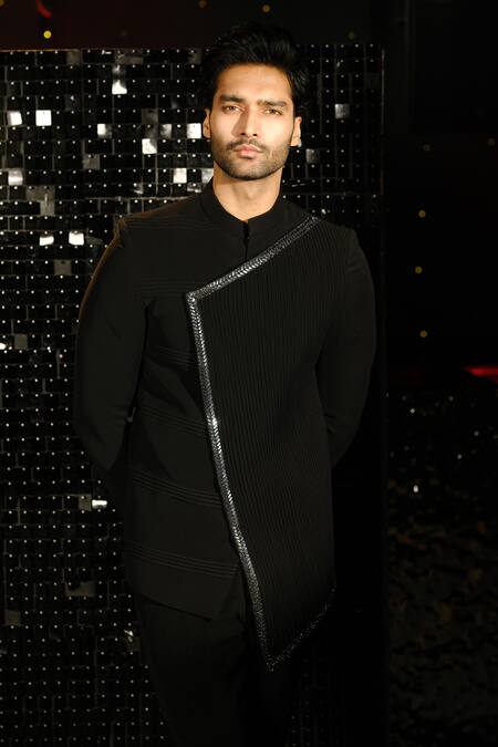 Shop Sanjana Reddy Designs Black Polyester Border Embroidered Pintucked Asymmetric Bandhgala With Trouser Online at Aza Fashions Shop_Sanjana Reddy Designs_Black Polyester Border Embroidered Pintucked Asymmetric Bandhgala With Trouser _Online_at_Aza_Fashions