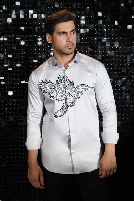 Shop Sanjana Reddy Designs White Stretchable Cotton Embroidery Kingfisher Mighty Rise Cutdana Shirt Online at Aza Fashions Shop_Sanjana Reddy Designs_White Stretchable Cotton Embroidery Kingfisher Mighty Rise Cutdana Shirt _Online_at_Aza_Fashions
