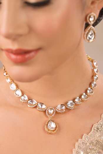 Shop_Anana_Gold Plated Imitation Diamonds Upasana Kundan Embellished Necklace Set _Online_at_Aza_Fashions