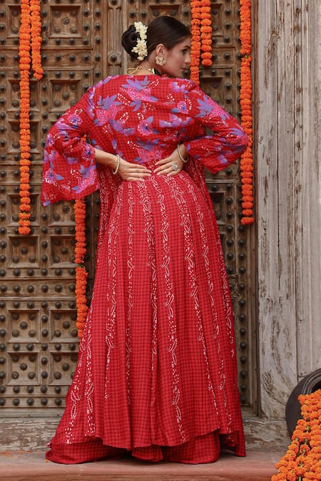 Shop Gazab by Miku Kumar Maroon Muslin Embroidery Split V-neck Elsa Pre-draped Pant Saree Set With Cape at Aza Fashions Shop_Gazab by Miku Kumar_Maroon Muslin Embroidery Split V-neck Elsa Pre-draped Pant Saree Set With Cape _at_Aza_Fashions