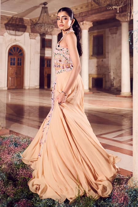 Shop Swish By Dolcy And Simran Peach Net, Crepe, Linen Nafisa Embellished Lehenga With Embroidered Blouse Online at Aza Fashions Shop_Swish By Dolcy And Simran_Peach Net, Crepe, Linen Nafisa Embellished Lehenga With Embroidered Blouse _Online_at_Aza_Fashions