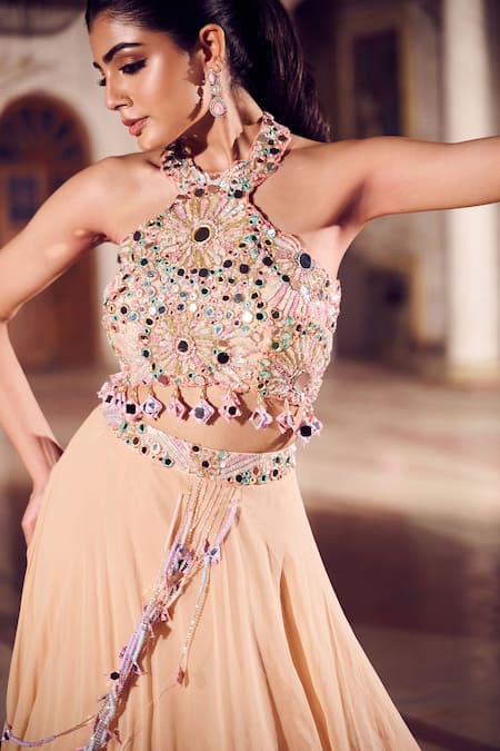 Swish By Dolcy And Simran Peach Net, Crepe, Linen Nafisa Embellished Lehenga With Embroidered Blouse at Aza Fashions Swish By Dolcy And Simran_Peach Net, Crepe, Linen Nafisa Embellished Lehenga With Embroidered Blouse _at_Aza_Fashions