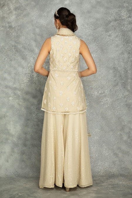 Shop_Tanu Malhotra_Ivory Net, Organza Sequins, Crystals, Floral Peplum Kurta And Sharara Set _at_Aza_Fashions