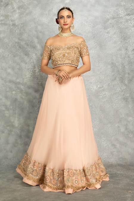 Tanu Malhotra_Peach Net, Georgette Sequins, Stones, Fringe Floral Embroidered Lehenga Set _Online_at_Aza_Fashions
