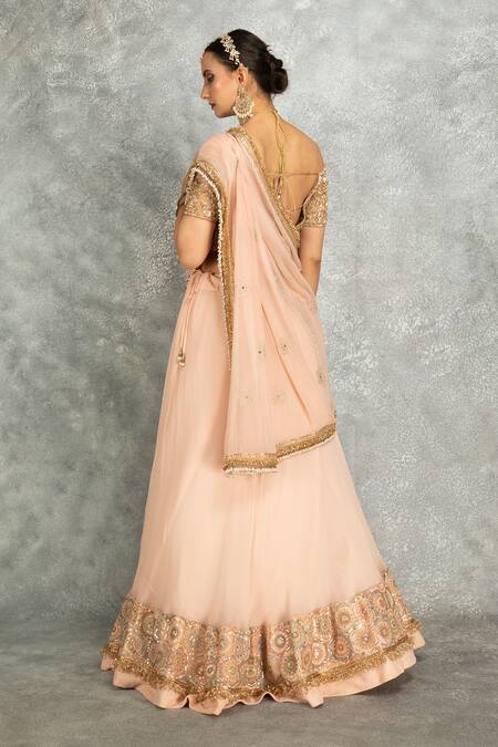 Buy_Tanu Malhotra_Peach Net, Georgette Sequins, Stones, Fringe Floral Embroidered Lehenga Set 