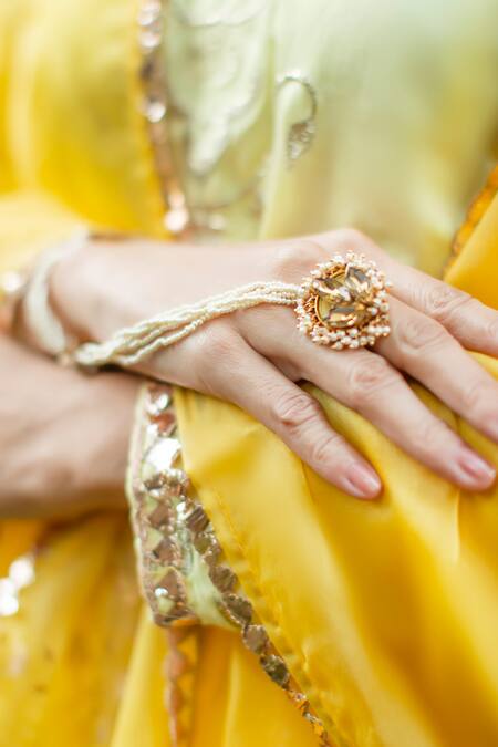 Buy_Ornamaas_Ivory Pearls, Crystals Petal Bloom Embellished Haathphool _Online_at_Aza_Fashions