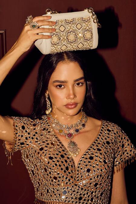 Buy The Leather Garden Ivory Floral Embroidered Potli Bag Buy_The Leather Garden_Ivory Floral Embroidered Potli Bag