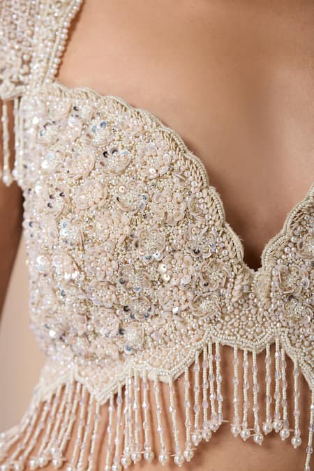 Chaashni By Maansi And Ketan White Net Sequins, Cut Work, Zari Sweetheart Tassel Embroidered Lehenga Set at Aza Fashions Chaashni By Maansi And Ketan_White Net Sequins, Cut Work, Zari Sweetheart Tassel Embroidered Lehenga Set_at_Aza_Fashions