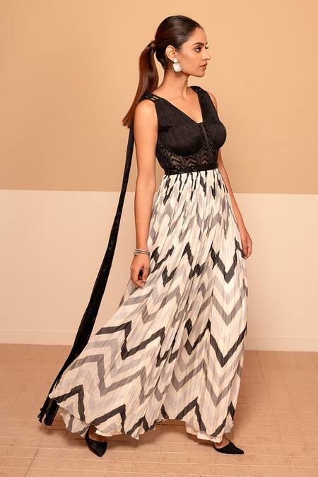 Shop Kelaayah Black Chiffon Cut Work, Sequins V-neck And White Chevron Print Jumpsuit at Aza Fashions Shop_Kelaayah_Black Chiffon Cut Work, Sequins V-neck And White Chevron Print Jumpsuit_at_Aza_Fashions