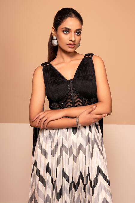 Kelaayah Black Chiffon Cut Work, Sequins V-neck And White Chevron Print Jumpsuit Online at Aza Fashions Kelaayah_Black Chiffon Cut Work, Sequins V-neck And White Chevron Print Jumpsuit_Online_at_Aza_Fashions