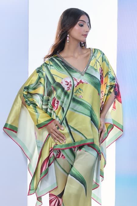Pria Kataria Puri_Yellow Satin Printed Tulip V-neck Asymmetric Top And Pant Set _at_Aza_Fashions