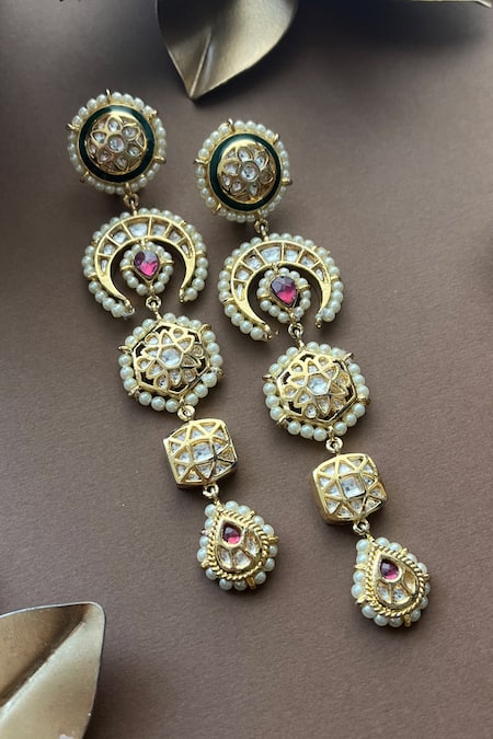 Shop Vasundhara Gold Plated Pearls Crescent Floral Kundan Earrings at Aza Fashions Shop_Vasundhara_Gold Plated Pearls Crescent Floral Kundan Earrings _at_Aza_Fashions