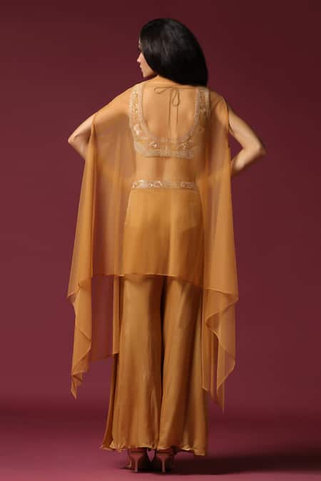 Shop Two Sisters By Gyans Gold Chiffon Pearls, Sequins, Embroidery V-neck Cape Sharara Set at Aza Fashions Shop_Two Sisters By Gyans_Gold Chiffon Pearls, Sequins, Embroidery V-neck Cape Sharara Set _at_Aza_Fashions