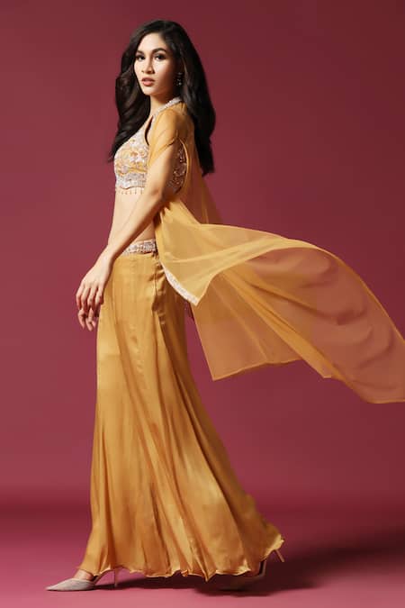 Shop Two Sisters By Gyans Gold Chiffon Pearls, Sequins, Embroidery V-neck Cape Sharara Set Online at Aza Fashions Shop_Two Sisters By Gyans_Gold Chiffon Pearls, Sequins, Embroidery V-neck Cape Sharara Set _Online_at_Aza_Fashions