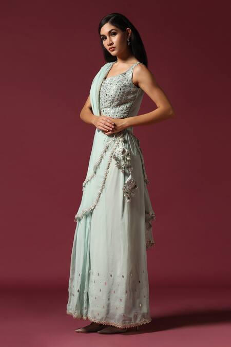 Buy Two Sisters By Gyans Blue Georgette Gota Patti, Tassels Square Neck, Embroidered Sharara Saree Set Online at Aza Fashions Buy_Two Sisters By Gyans_Blue Georgette Gota Patti, Tassels Square Neck, Embroidered Sharara Saree Set _Online_at_Aza_Fashions