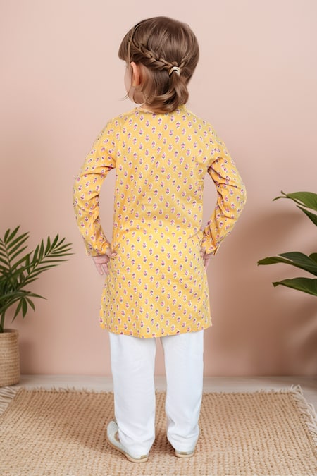 Shop Petite Pomme Yellow Cotton Floral Print Kurta Set at Aza Fashions Shop_Petite Pomme_Yellow Cotton Floral Print Kurta Set _at_Aza_Fashions