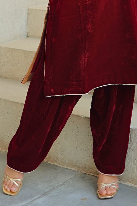 Sheetal Batra_Maroon Silk, Velvet Embroidery Round Neck Kirandori Kurta And Salwar Set _at_Aza_Fashions