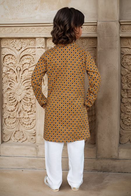 Shop Petite Pomme Yellow Cotton Floral Printed Mandarin Collar Kurta Set at Aza Fashions Shop_Petite Pomme_Yellow Cotton Floral Printed Mandarin Collar Kurta Set _at_Aza_Fashions