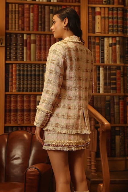 Shop Label Deepika Nagpal Pink Tweed, Silk Ruffles, Fringe Collared Blazer And Skirt Set at Aza Fashions Shop_Label Deepika Nagpal_Pink Tweed, Silk Ruffles, Fringe Collared Blazer And Skirt Set _at_Aza_Fashions