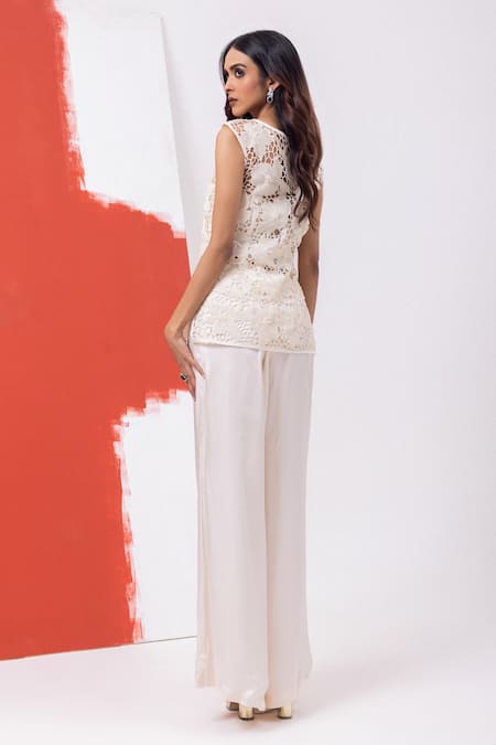 Shop_Mehak Sharma_White Satin Cut Work, Pearls Round Cutdana Embroidered Top And Flared Pant Set _at_Aza_Fashions